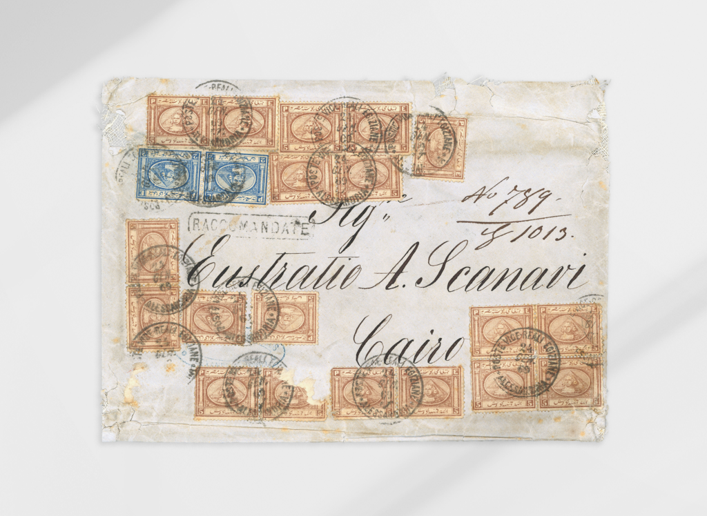 10135 Sold at 27060 CHF 1pi Rose-red, three singles, six pairs and one block of four, plus 2pi blue, pair, all tied on large part registered 1869 (24.1) envelope